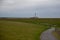 View from the dike to the lighthouse Westerheversand