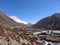 View of Dingboche village which lies in the Imja Khola river valley and Mt Lhotse, Sagarmatha National Park, Nepal