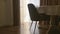 View of a dining room, round table, chairs and window decorated with curtains, furniture and luxury interior design