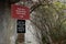 View of directional sign which leads to Skyride Entrance and Guest Services Building at the Grouse Mountain Ski Resort