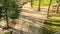 View of a dirt path that divides in two directions seen from a bridge