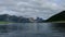 View from the dock to the beautiful fjord boat sails into the