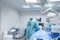 View of doctors operating patient in surgery room