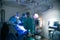 View of doctors operating patient in surgery room