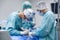 View of doctors operating patient in surgery room