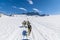 A view of a dog sleigh team heading east on the Denver glacier close to Skagway, Alaska