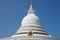 view of dome of ancient religious temple against blue sky in Asia