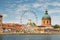 View of the dome of La Grave St-Joseph\\\'s Chapel and the ferris wheel in Viguerie Port