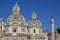 View of the domes of the churches and Trajan`s Column at the Trajan Forum, Rome, Italy
