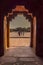 A view through a doorway in the abandoned temple at Fathepur Sikri, India at sunset