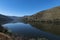 View of Douro River with terraced vineyards near the village of Pinhao, in Portugal