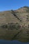 View of Douro River with terraced vineyards near the village of Pinhao, in Portugal