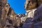 A view down a narrow passage leading to the ancient city of Petra, Jordan