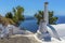 A view down a path past a church on Skaros Rock in Santorini