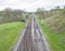 View down railway track in english countryside