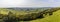 A view down from the southern ramparts of the Iron Age Hill fort remains at Burrough Hill in Leicestershire, UK