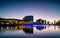 View down Yarra River towards Seafarers Bridge and lights of city buildings in long exposure