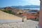 View downstairs to the port of old Portoferraio city with the fort Stella on the hill, Elba island.