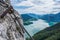 View from Drachenwand rock on Mondsee and Attersee. Via ferrata in Halstatt region, Austria. A steel rope is attached to the rock