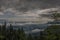 View on Drau river valley from path to Mittagskogel hill in cloudy summer day