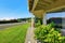 View of driveway near luxury American house exterior.