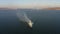 View from a drone of an anti-submarine ship going out to sea