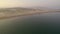 View from the drone of a city on the shore of the Mediterranean sea.