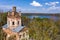 View from the drone of the upper part of the half-dispersed church on the banks of the Uvodsky reservoir, Egoriy village, Ivanovo