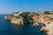 View of Dubrovnik and it`s city wall from the Adriatic Sea with Fort Lovrijenac
