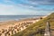 View from a dune to the beach with beach chairs on the German North Sea island of Sylt