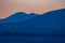 View of the dunes of Corralejo and silhouetted hills at sunset on the Canary Island of Fuerteventura, Spain