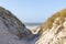 View through the dunes to the beach of Amrum