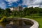 View of Dunrobin Castle and Gardens in the Scottish Highlands and castle reflection in the fountain