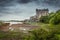 View of the Dunvegan castle overlooking the coast in a moment of low tide