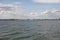 View at Durgerdam, seen from a boat on the Markermeer, historic little typical dutch village with wooden houses.