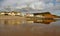 View of the easten end of Sidmouth Esplanade and sandstone cliff. This cliff has regular rockfalls which reduce the lengths of the