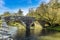 A view of the eighteenth century, grade 2 listed bridge at Llawhaden that spans the River Cleddau, Wales