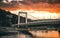 View of the Elisabeth bridge over the Danube captured from Pest side with the Gellert Hill in the background at sunset