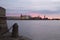 The view of the embankment of the river Neva are decorated with granite and anchor chains at sunset. Spring. Saint-Petersburg. Rus