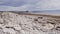 View of the empty limestone rocky beach of Inis Oirr Island