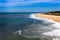 View of empty long Nazare North beach