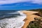 View of empty long Nazare North beach from Nazare. Atlantic Ocean, Portugal