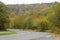 The view the empty road overlooking fall foliage near Point of Gap Overlook, Poconos, Pennsylvania, U.S.A