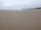 View of Empty Vast Sandy Beach in Oregon