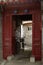 A view of an entrance of a courtyard in a traditional Beijing H