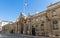 View of entrance gate of the Elysee Palace from the Rue du Faubourg Saint-Honore. Elysee Palace - official residence of