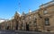 View of entrance gate of the Elysee Palace from the Rue du Faubourg Saint-Honore . Elysee Palace - official residence of