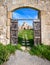 A view through the entrance gate of Panagia Kanakaria Church and Monastery in the turkish occupied side of Cyprus 3