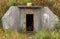 The view of the entrance to an abandoned Soviet military bunker