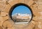 View of Essaouira through hole in wall